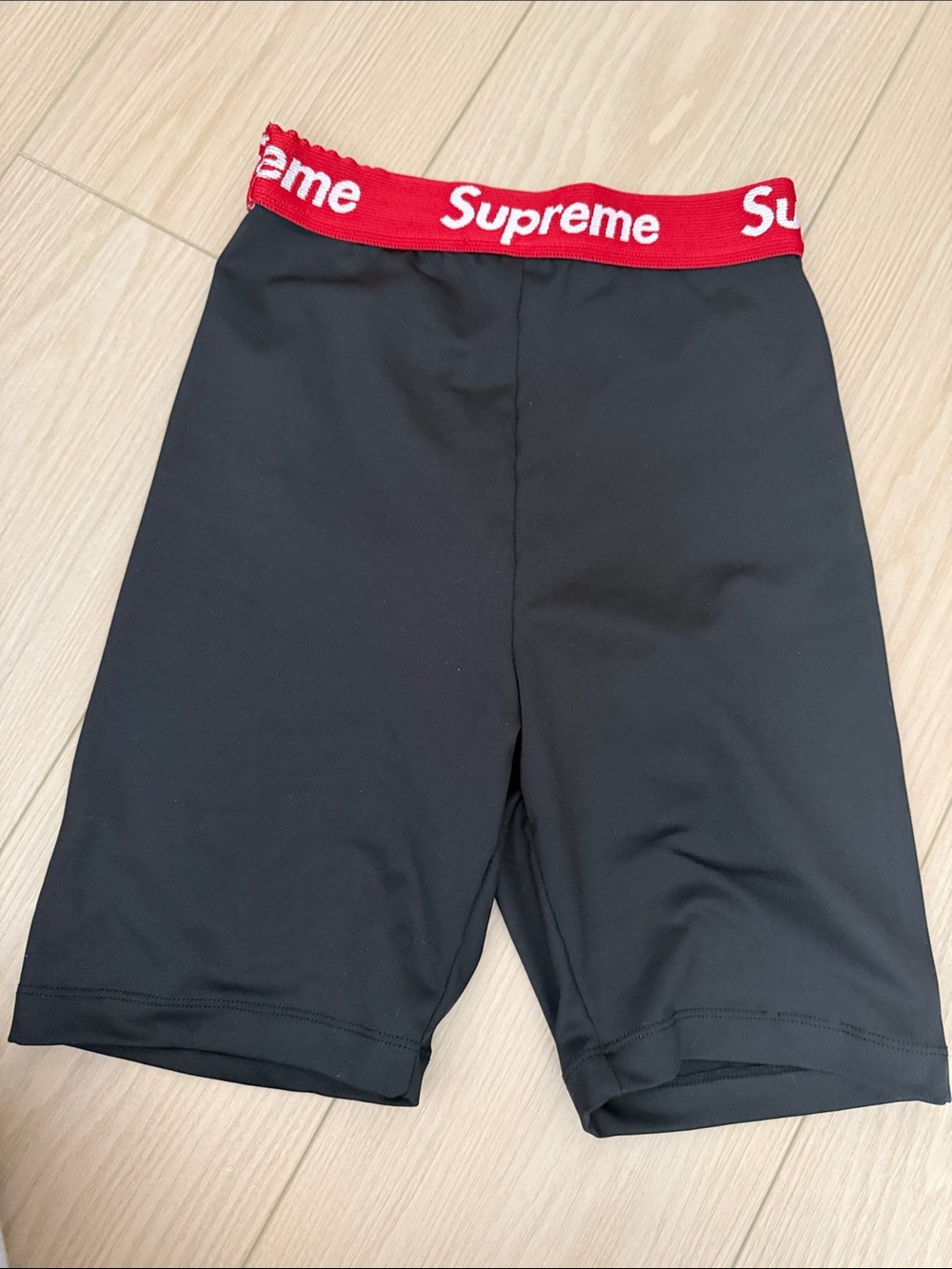 Supreme Black Bike Shorts with Red Logo Waistband